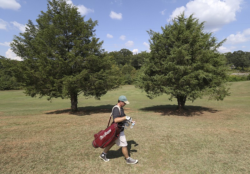 Staff Photo by Dan Henry / The Chattanooga Times Free Press- 9/13/16. Pat Finnegan plays golf at Lupton City Golf Club while speaking about how he will play 72 holes of golf without a cart or caddy on Thursday to raise money for Ronald McDonald House Charities. 