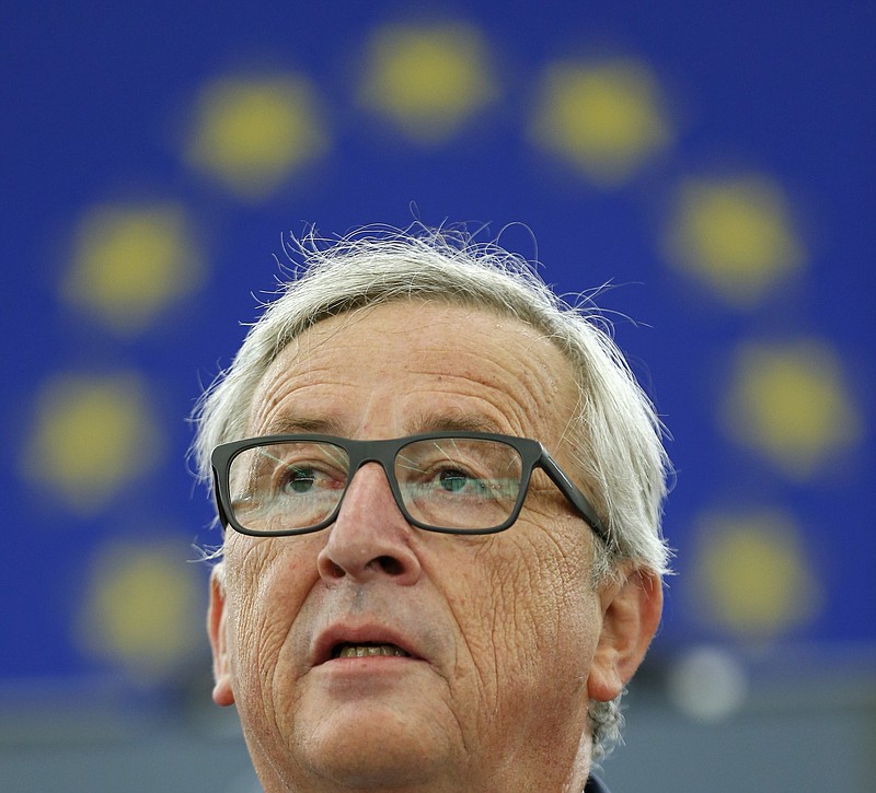 
              EU Commission President Jean-Claude Juncker delivers his State of the Union address at the European Parliament in Strasbourg, eastern France, Wednesday, Sept. 14, 2016. Juncker, the head of the European Union's executive said that the EU "still does not have enough Union" and that the bloc still needs more united action to move forward in the face of widespread opposition to more centralized powers for the bloc. (AP Photo/Jean Francois Badias)
            