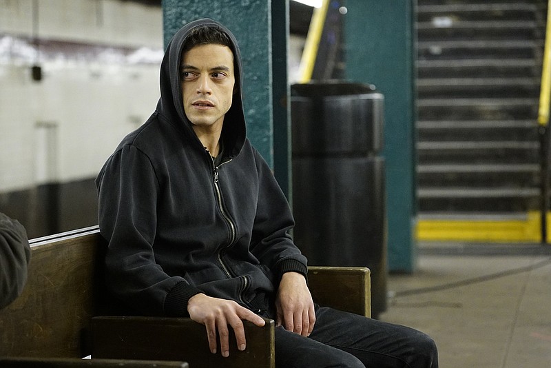 
              In this image released by USA Network, Rami Malek appears in a scene from, "Mr. Robot." On Thursday, July 14, 2016, Malek is nominated for outstanding actor in a drama series for his role. The 68th Primetime Emmy Awards will be broadcast live Sunday on ABC beginning at 8 p.m. ET on ABC. (Peter Kramer/USA Network via AP)
            