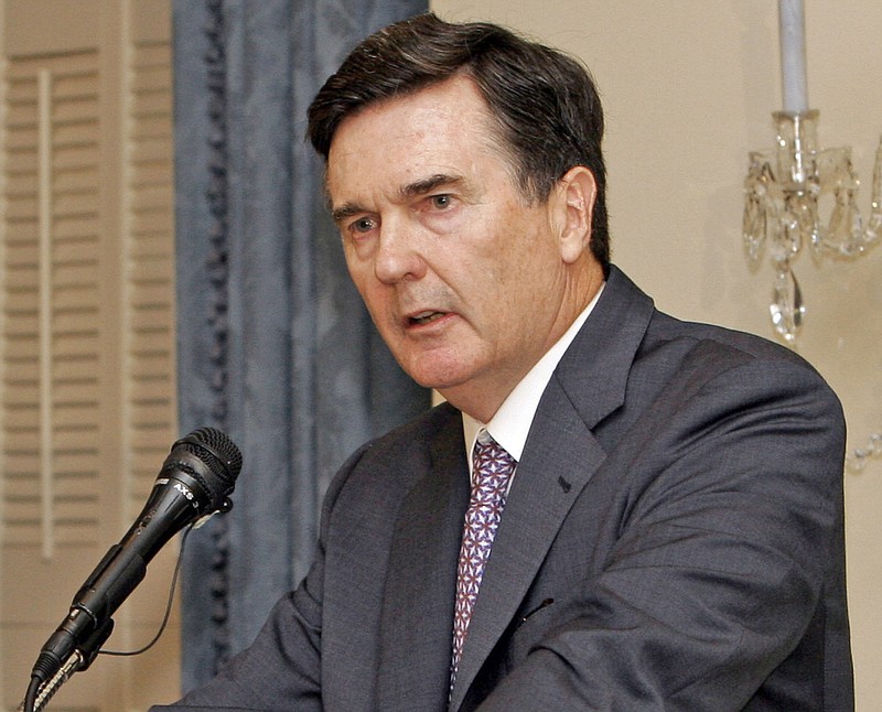 In this Thursday, Sept. 6, 2007, file photo, Federal Reserve Bank of Atlanta President Dennis Lockhart speaks at an Atlanta Press Club luncheon, in Atlanta. Lockhart, the president of the Federal Reserve's Atlanta regional bank, has announced plans to step down in February 2017. Lockhart is leaving after a decade as president of the Atlanta bank, one of the Fed's 12 regional banks. Lockhart says he plans to pursue his interests in public policy, civic work and private business after stepping down on Feb. 28. (AP Photo/Gene Blythe, File)