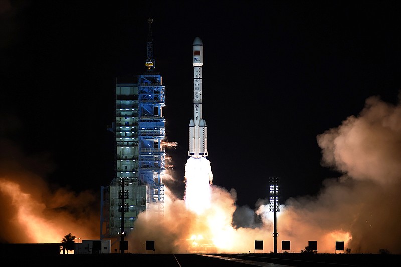 
              The Long March 7 rocket carrying the Tiangong-2 module blasts off from the Jiuquan Satellite Launch Center in Jiuquan, northwest China's Gansu Province, Thursday, Sept. 15, 2016. China has launched its second space station in a sign of the growing sophistication of its military-backed program that intends to send a mission to Mars in the coming years. (Chinatopix via AP)
            