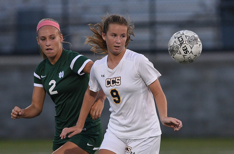 Chattanooga Christian's Katie Davick and Notre Dame's Alexis Brown keep their eyes on the ball Thursday, September 15, 2016 at Chattanooga Christian School.