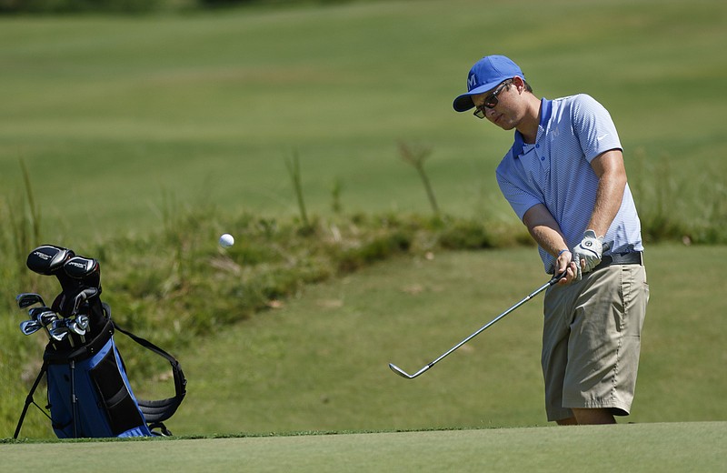 McCallie golfer Griffin McCloy chips onto the green during their Division II-AA East/Middle Region golf match against Baylor at Sweetens Cove Golf Club on Thursday, Sept. 15, 2016, in South Pittsburg, Tenn.