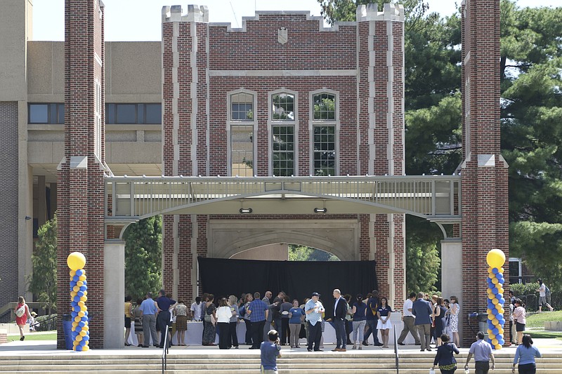 Attendees enjoy refreshments at the conclusion of a ribbon-cutting to officially reopen Chamberlain Field on Thursday, September 15, 2016.