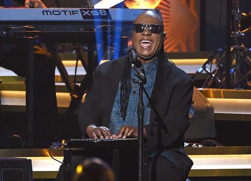 
              FILE - In this Feb. 13, 2016 file photo, Stevie Wonder performs at the Los Angeles Convention Center in Los Angeles, Ca. Wonder and members of Prince's inner circle will highlight a family-sanctioned Prince tribute concert in St. Paul on Oct. 13, 2016. The lineup also includes Christina Aguilera, Chaka Khan, John Mayer, Tori Kelly, Anita Baker, Doug E. Fresh, Luke James, Bilal and Mint Condition. (Photo by Chris Pizzello/Invision/AP, File)
            