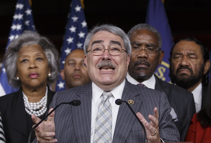 
              FILE - In this July 8, 2016 file photo, Congressional Black Caucus Chairman Rep. G. K. Butterfield, D-N.C., center, accompanied by, from left, Rep. Joyce Beatty , D-Ohio, Rep. Hakeem Jeffries, D-N.Y., Butterfield, Rep. Gregory W. Meeks, D-N.Y., and Rep. Al Green, D-Texas, speaks during a news conference on Capitol Hill in Washington. Black voters reacted skeptically on Friday to Republican presidential nominee Donald Trump’s public admission that he now believes the nation’s first black president was indeed born in the United States. Many said the fact that Trump spent many years questioning President Barack Obama’s national origin was disrespectful, and an insult to all black Americans.  (AP Photo/J. Scott Applewhite, File)
            