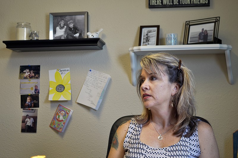 Jennifer Weiss-Burke, executive director of a youth recovery center in Albuquerque, N.M., speaks about her son on Aug. 9, 2016. She says Cameron's descent into drug addiction started with a painkiller prescription from his doctor and ended with a fatal heroin overdose nearly three years later. (AP Photo/Mary Hudetz)