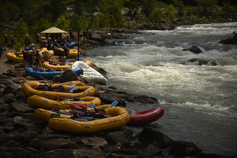 Rafts line the shore Sunday, July 17, 2016, near the Ocoee Whitewater Center.