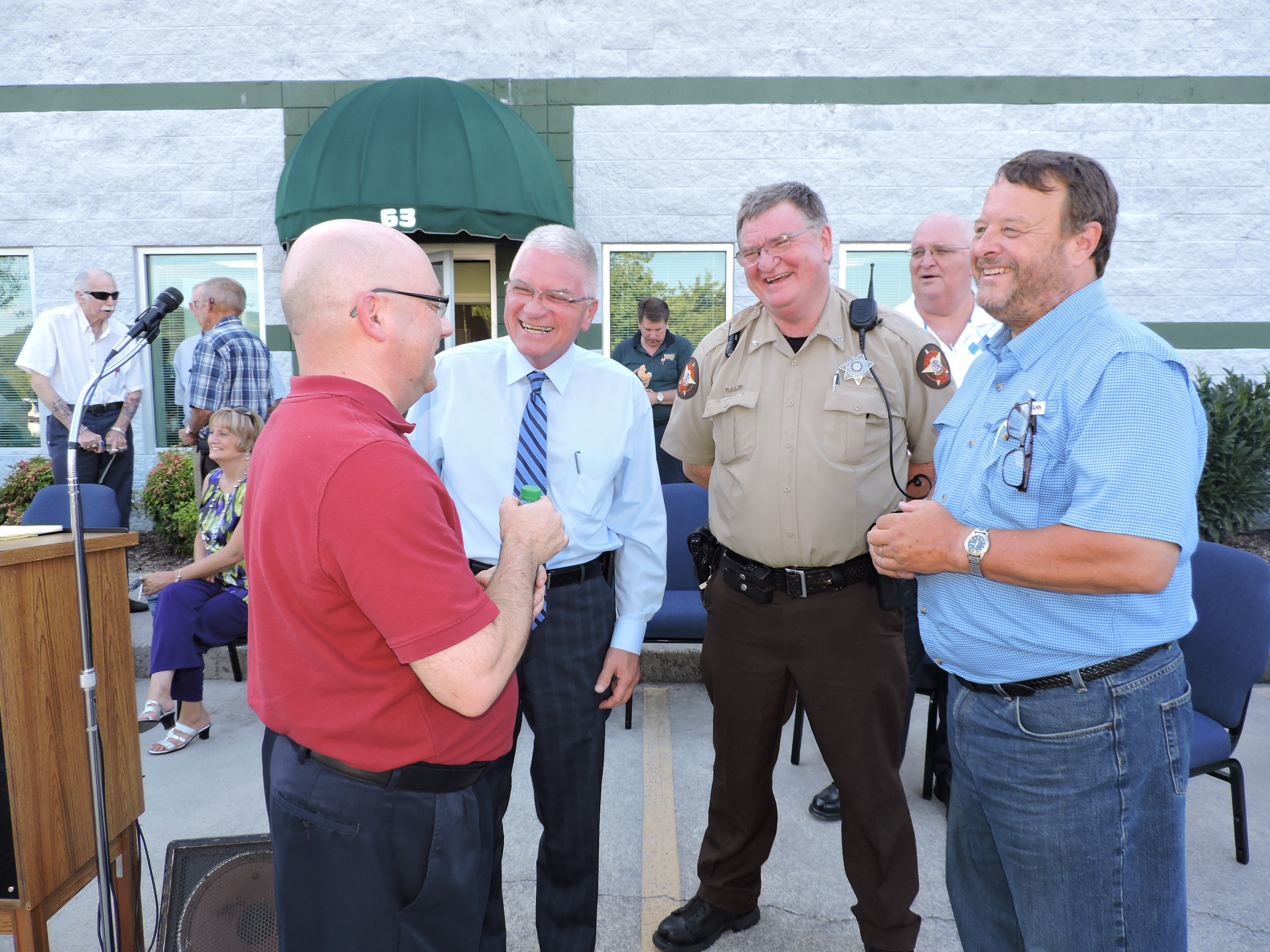 From left, Jim Hill, Walker County Sheriff Steve Wilson, Ridgeland High School Resource Officer Bruce Coker and Mountain View Estates owner David Roden talk about what a positive impact the new Walker County Sheriff's Satellite Office will have on the surrounding area.
