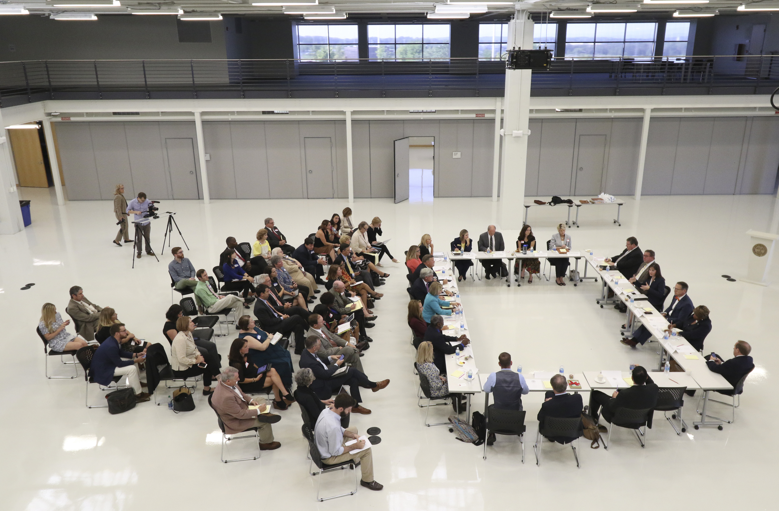 Staff Photo by Dan Henry / The Chattanooga Times Free Press- 9/20/16. The public and media attend Education Mini-Summit 2016 at the Volkswagen Conference Center on September 20, where Tennessee legislators from Hamilton County and local education officials discuss the county's public school system. The district is producing lower-than-expected test results and have Teacher's rated least effective by state measures.