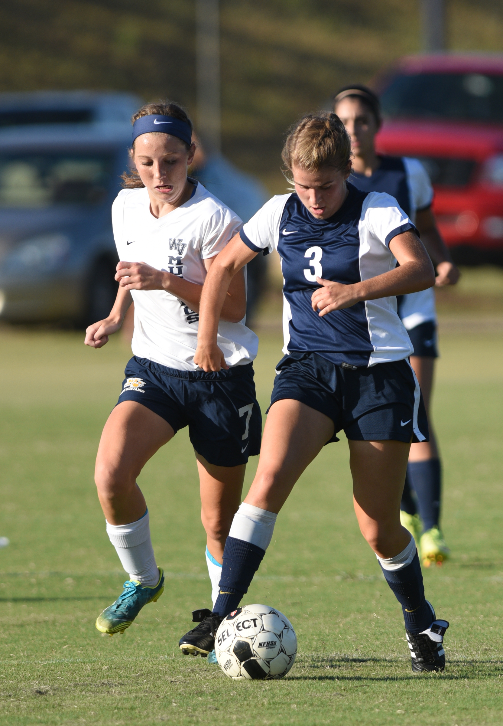 Soddy-Daisy's Grace Sims and Walker Valley's Jade Mayo pursue the ball Tuesday, September 20, 2016 at Walker Valley High School.