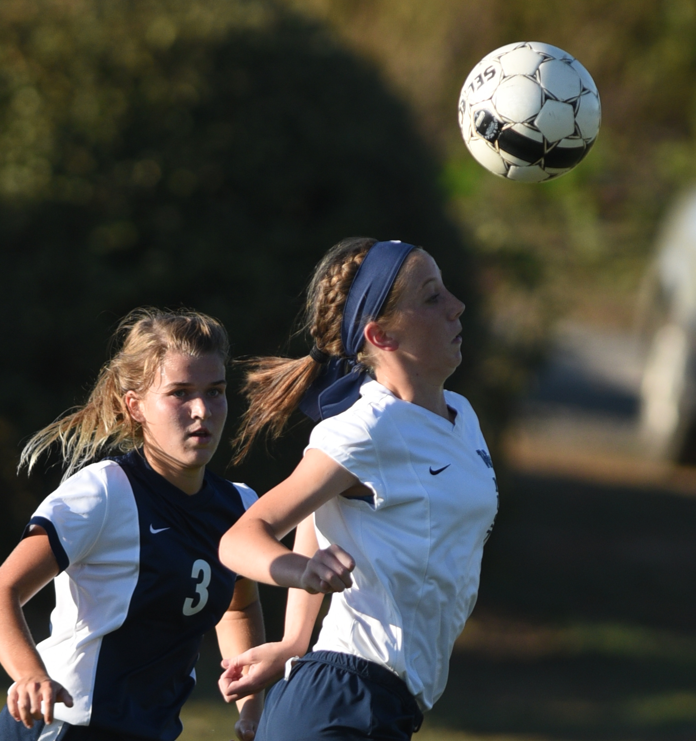 Soddy-Daisy's Grace Sims and Walker Valley's Jade Mayo pursue the ball Tuesday, September 20, 2016 at Walker Valley High School.