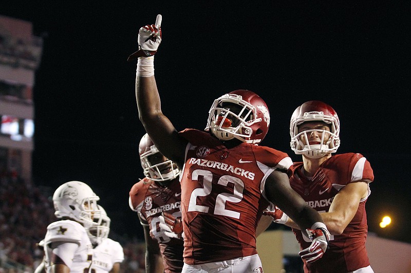Arkansas running back Rawleigh Williams III celebrates after scoring a touchdown during the third quarter of last Saturday's 42-3 win over Texas State. The Razorbacks face Texas A&M this week in a matchup of 3-0 teams.