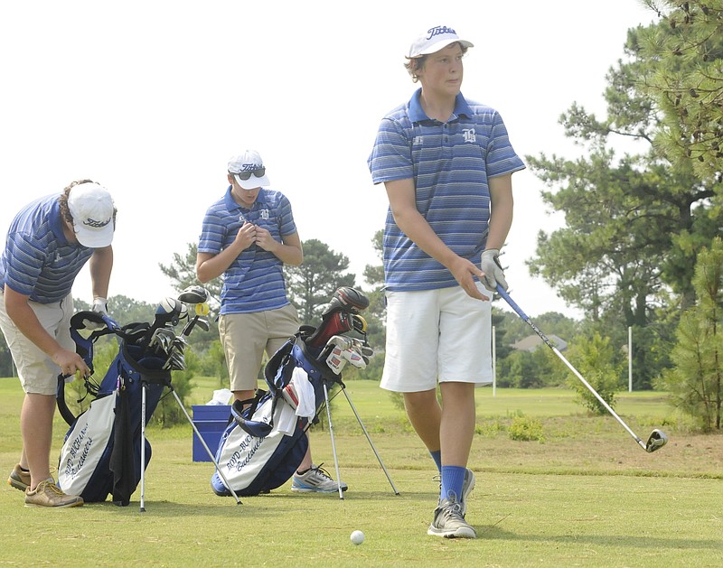 Boyd-Buchanan's Trent Cooper prepares to hit during practice at the Hickory Valley Golf complex on Friday.
