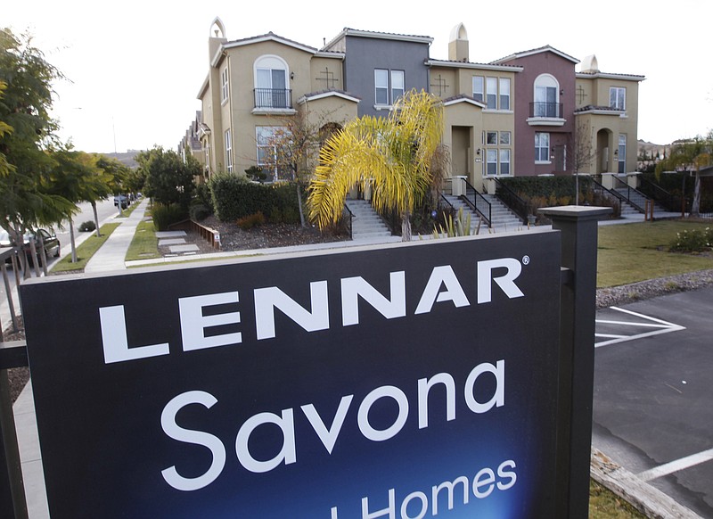 
              FILE - In this Jan. 6, 2012, file photo, Lennar homes are advertised for sale in San Jose, Calif. Lennar Corp. reports financial results on Tuesday, Sept. 20, 2016. (AP Photo/Paul Sakuma, File)
            