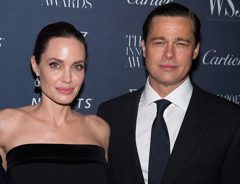 In this Nov. 4, 2015, file photo Angelina Jolie Pitt and Brad Pitt attend the WSJ Magazine Innovator Awards 2015 at The Museum of Modern Art in New York. Jolie has filed for divorce from Pitt, bringing an end to one of the world's most star-studded, tabloid-generating romances.