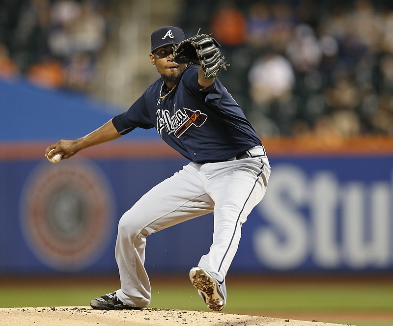 Atlanta Braves starting pitcher Julio Teheran delivers during the first inning of a baseball game against the New York Mets, Tuesday, Sept. 20, 2016, in New York.