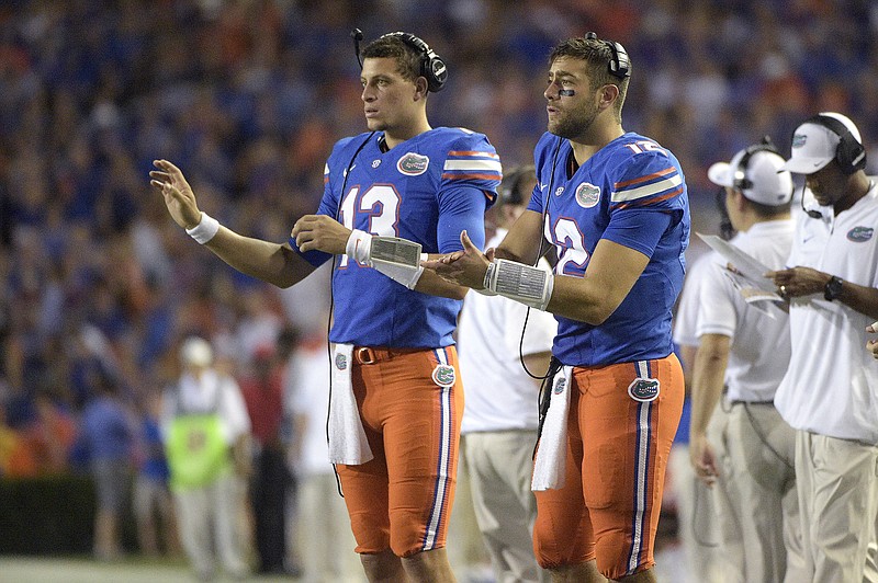 Florida backup quarterbacks Austin Appleby, right, and Feleipe Franks signal a play call during last week's game against North Texas. With top Gators quarterback Luke Del Rio injured, Appleby is expected to start Saturday at Tennessee, and Franks or fellow freshman Kyle Trask could take some snaps.