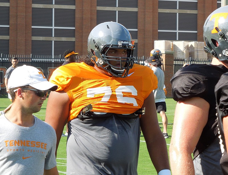 Tennessee offensive tackle Chance Hall looks on during drills as the Vols continued preparations for Florida on Tuesday at Haslam Field.