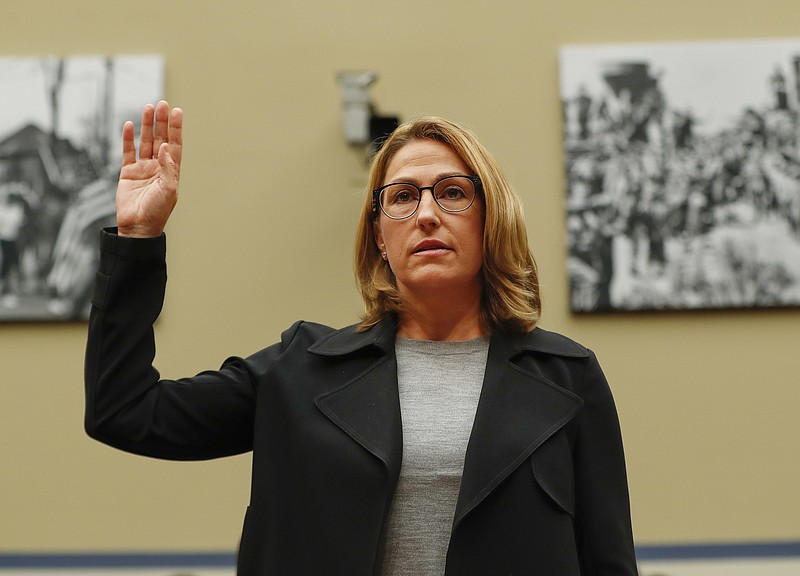 
              Mylan CEO Heather Bresch is sworn in on Capitol Hill in Washington, Wednesday, Sept. 21, 2016, prior to testifying before the House Oversight Committee hearing on EpiPen price increases. Bresch defended the cost for life-saving EpiPens, signaling the company has no plans to lower prices despite a public outcry and questions from skeptical lawmakers. (AP Photo/Pablo Martinez Monsivais)
            