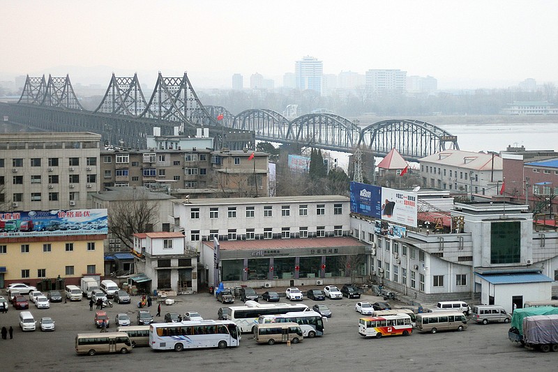 
              In this Thursday, March 17, 2016 photo, vehicles wait at a border checkpoint to cross into North Korea in Dandong in northeastern China's Liaoning Province. Chinese authorities are investigating a company that researchers say sold North Korea materials that can be used by its growing nuclear weapons program in a crackdown that reflects Beijing's growing frustration with its isolated neighbor. (Chinatopix via AP)
            