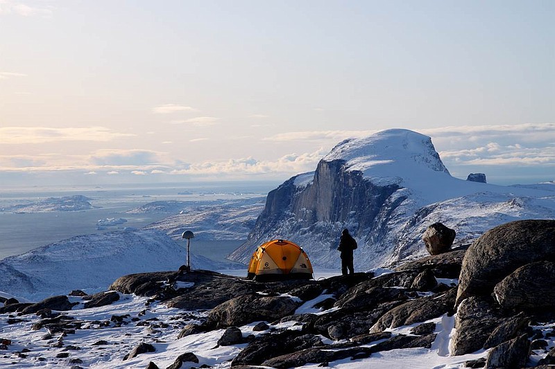 
              In this photo provided by Michael Bevis, The Ohio State University, the Greenland Global Positioning System (GPS) Network (GNET)  in Greenland. Greenland is losing about 40 trillion pounds more ice a year than scientists had thought, according to a new study that uses GPS to help estimate how much is melting there. A team of scientists used all sorts of devices to measure how much the ground is uplifting under Greenland’s melting ice sheet and found it is more than scientists had thought. (Michael Bevis, The Ohio State University via AP)
            