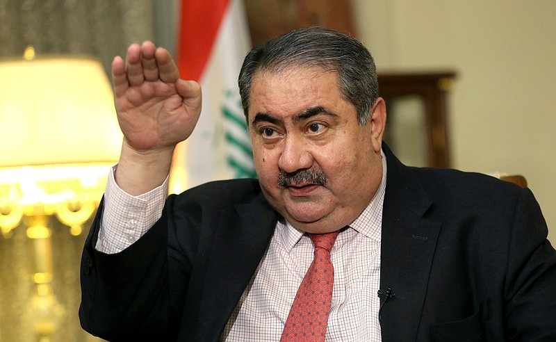 
              FILE - In this Dec 3, 2014 file photo, Iraq's Finance Minister Hoshyar Zebari speaks during an interview with the Associated Press in Baghdad, Iraq. Iraq's parliament has dismissed the finance minister after a no-confidence vote linked to allegations of corruption and mismanagement. The removal of Zebari, a former foreign minister and prominent Kurdish politician who has denied any wrongdoing, comes as Iraq is grappling with an economic crisis driven by low oil prices and the costs of battling the Islamic State group. (AP Photo/Hadi Mizban, File)
            