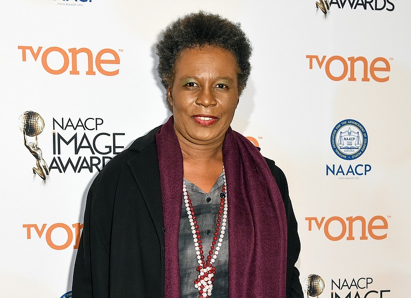 
              FILE - In this Jan. 17, 2015 file photo, Claudia Rankine attends the 46th NAACP Image Awards Nominees' Luncheon in Beverly Hills, Calif. Gene Luen Yang, a prize-winning author and the national ambassador for young people’s literature, and Rankine, one of poetry’s brightest and most innovative stars, are among this year’s 23 MacArthur fellows and recipients of the so-called “genius” grants. The fellows were announced Thursday, Sept. 22, 2016, by the Chicago-based John D. and Catherine T. MacArthur Foundation, which gives each honoree $625,000 over five years to spend any way he or she pleases, with no strings attached.  (Photo by Rob Latour/Invision/AP, File)
            