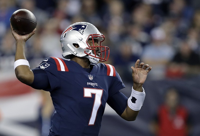 
              New England Patriots quarterback Jacoby Brissett (7) passes against the Houston Texans during the first half of an NFL football game Thursday, Sept. 22, 2016, in Foxborough, Mass. (AP Photo/Charles Krupa)
            
