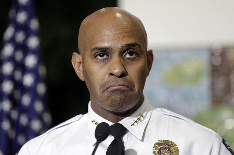 Charlotte-Mecklenburg Police chief Police Chief Kerr Putney pauses before answering a question during a news conference after a second night of violence following Tuesday's fatal police shooting of Keith Lamont Scott in Charlotte, N.C. Thursday, Sept. 22, 2016. Putney plans to show video of an officer shooting Scott to the slain man's family, but the video won't be immediately released to the public. (AP Photo/Chuck Burton)


