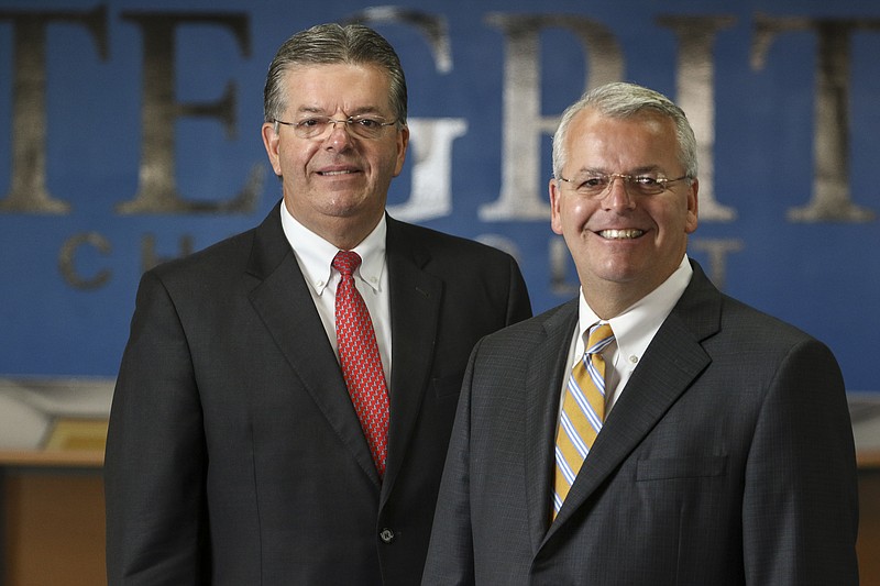 Staff Photo by Dan Henry / The Chattanooga Times Free Press- 9/8/16.  General Manager of Integrity Chevrolet Dwight Morgan, left, and his brother Brent Morgan, President of Integrity Automotive Group, speak about the automotive business and their upbringing during an interview on September 8, 2016. 