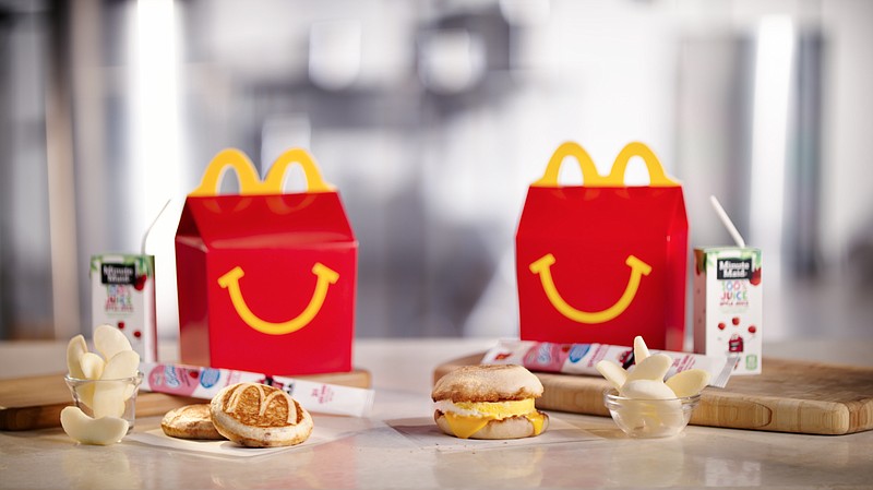 
              This photo provided by McDonald's shows a breakfast Happy Meal.  McDonald's is considering another addition to its all-day breakfast menu: Happy Meals. The fast-food chain says it will begin testing breakfast Happy Meals in Tulsa, Oklahoma on Sept. 26. The Happy Meals come with either two McGriddles cakes or an egg and cheese McMuffin.(McDonalds via AP)
            