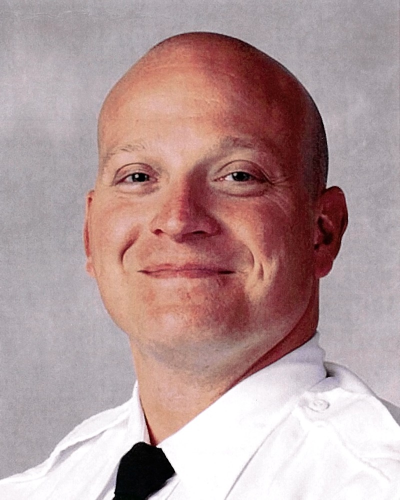 
              This June 22, 2015, photo provided by the Columbus, Ohio, Division of Police shows the division's official portrait of Columbus, Ohio, police officer Bryan Mason. Columbus, Ohio, police officer Bryan Mason, who authorities say fatally shot 13-year-old Tyre King on Wednesday, Sept. 14, 2016, received high marks in performance evaluations and has been involved in other on-the-job shootings, according to his personnel file obtained by The Associated Press through a public records request. (Columbus Division of Police via AP)
            