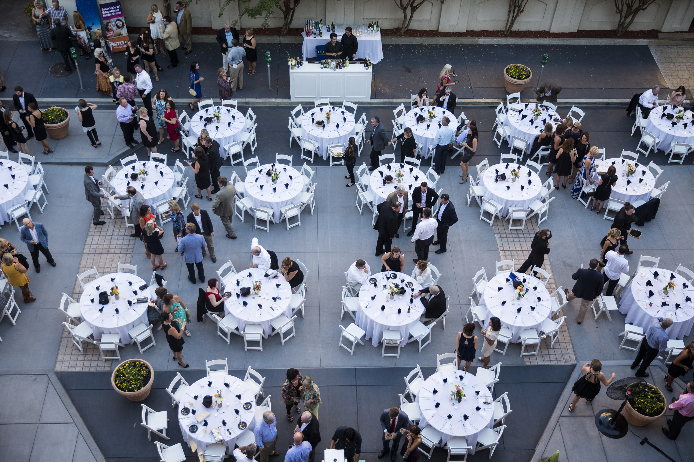 People attend the "Remembering the Past, Celebrating the Future" fundraiser to raise money for WTCI held on the newly repaved section of Chestnut Street between Martin Luther King, Jr., Boulevard and 8th Street on Saturday, Sept. 24, 2016, in Chattanooga, Tenn. The fundraiser featured music from Arlo Guthrie, the Dismembered Tennesseans, and Priscilla and Little Rickee.