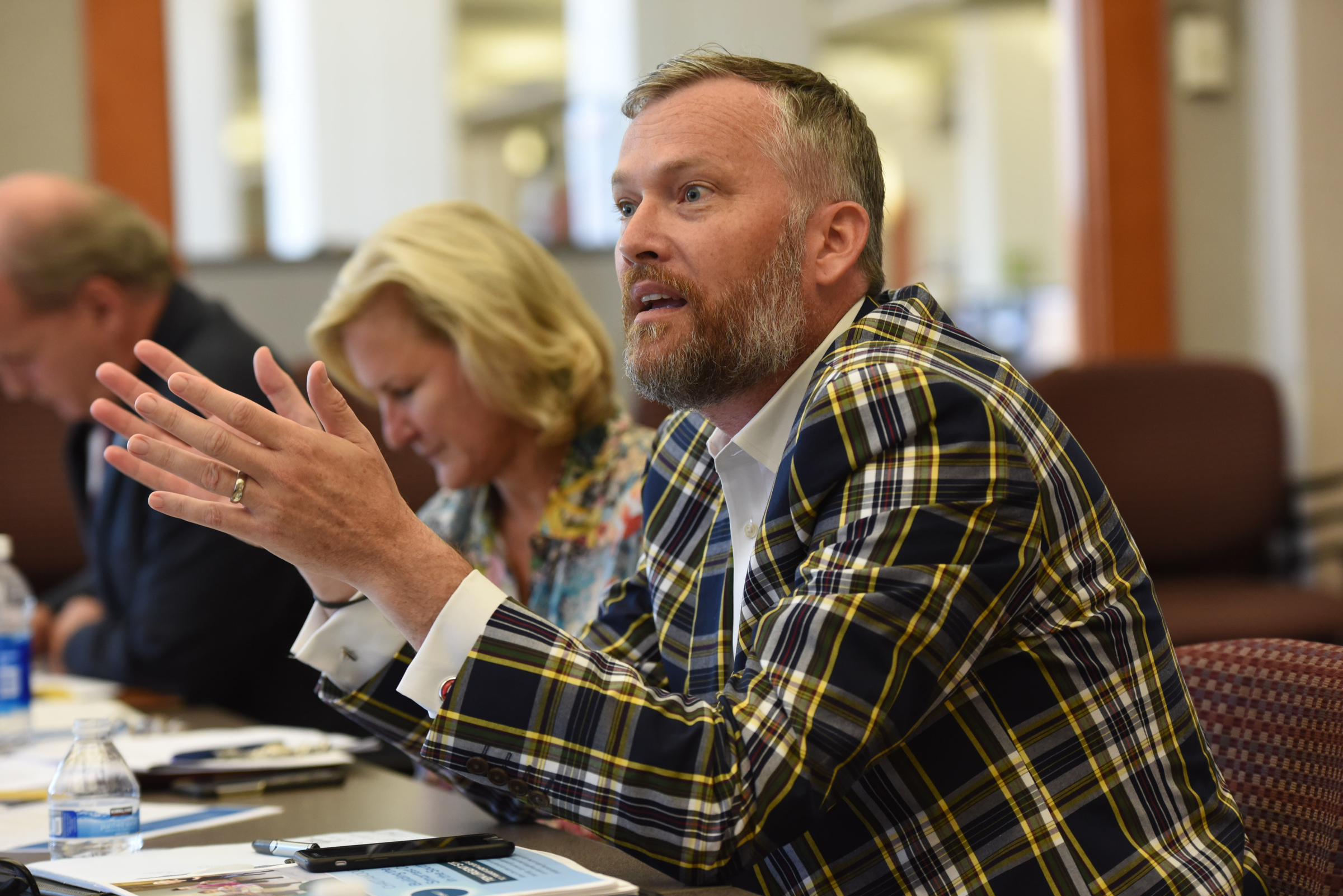 David Steele makes comments during a Chatt 2.0 meeting Friday at the Times Free Press. Sarah Morgan is seen to his left.