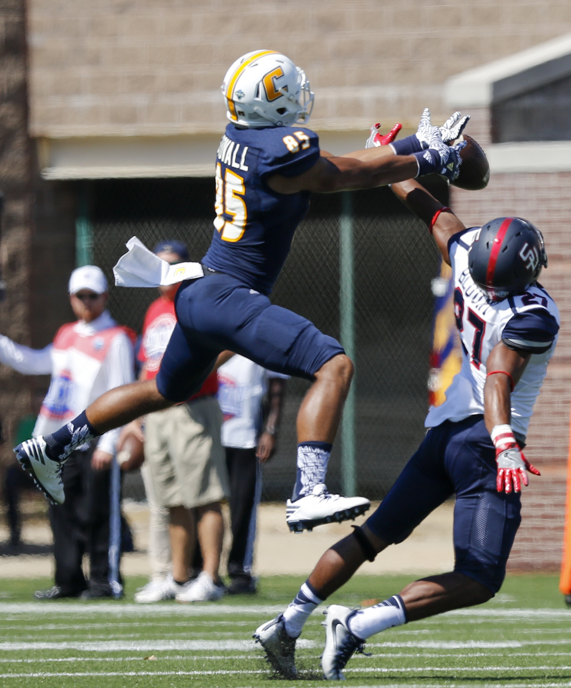 Samford safety Jamerson Blount intercepts a pass intended for UTC wide receiver James Stovall in the first quarter of the Mocs' home football game against the Bulldogs at Finley Stadium on Saturday, Sept. 24, 2016, in Chattanooga, Tenn.