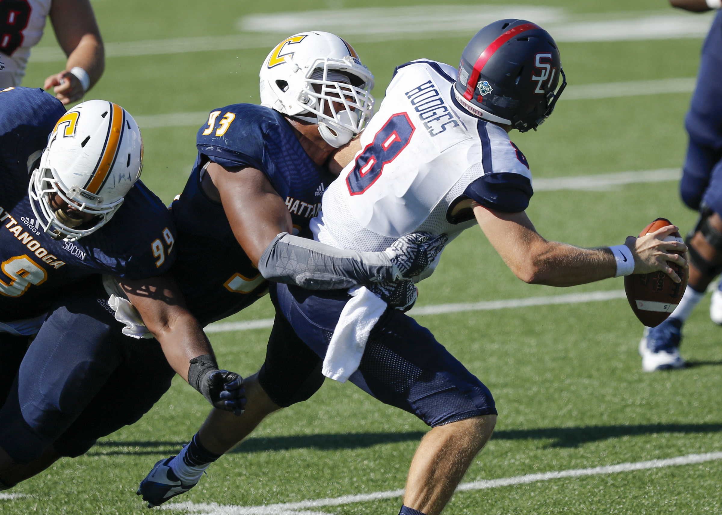 UTC defensive lineman Keionta Davis sacks Samford quarterback Devlin Hodges during the Mocs' home football game against the Bulldogs at Finley Stadium on Saturday, Sept. 24, 2016, in Chattanooga, Tenn.