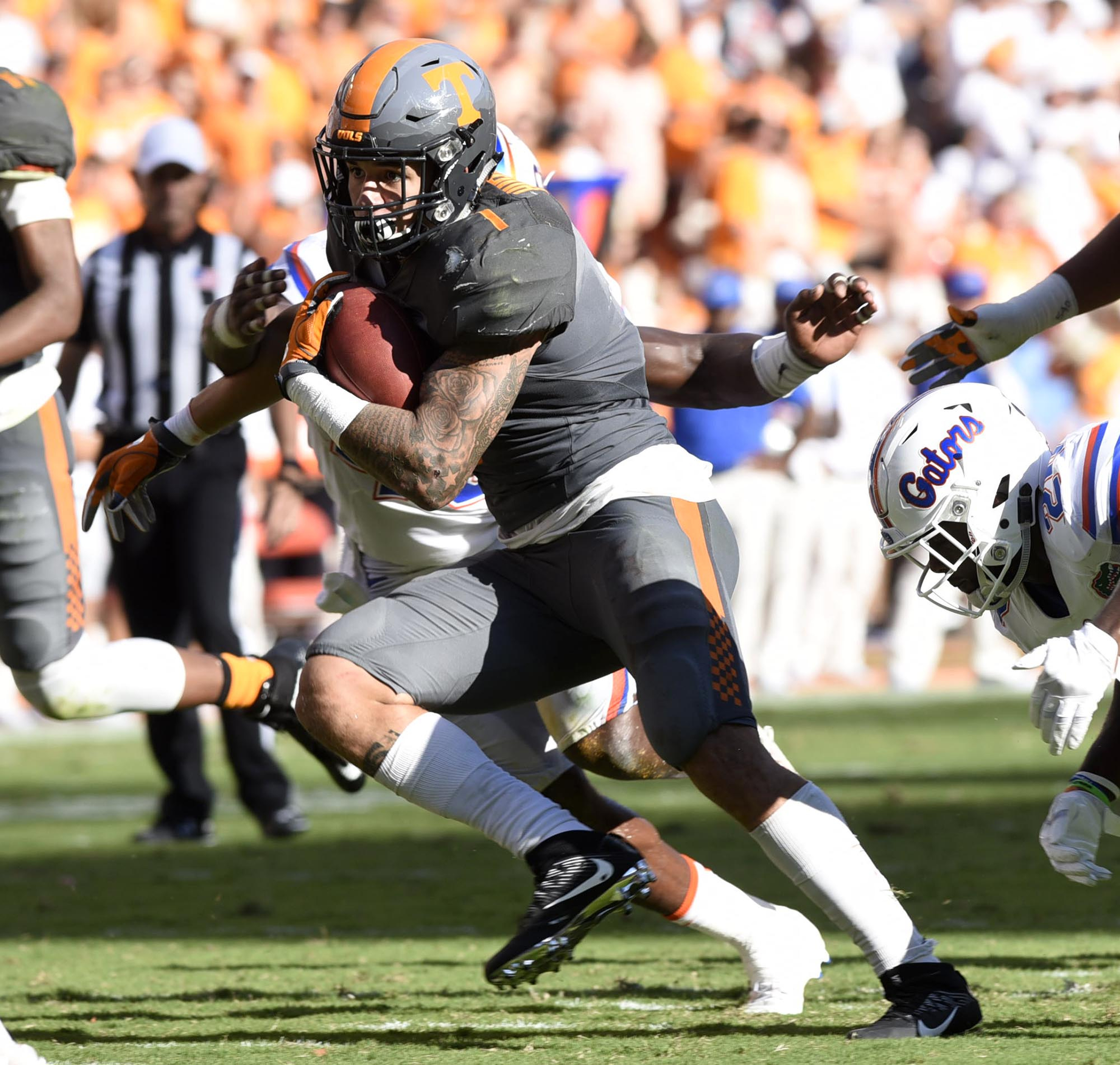 Tennessee's Jalen Hurd (1) goes for yardage in to the Florida secondary. The Florida Gators visited the Tennessee Volunteers in a important SEC football contest at Neyland Stadium on September 24, 2016.