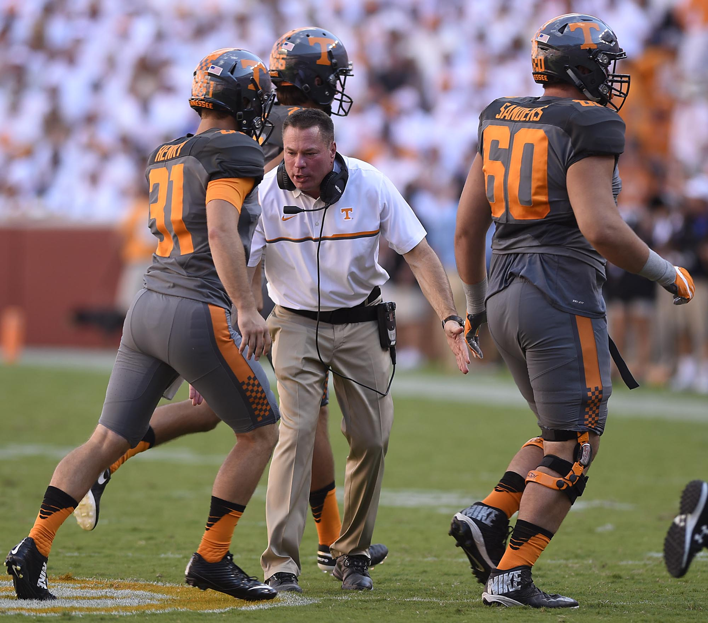 Butch Jones congraulates his players after a late field goal in the frist half. The Florida Gators visited the Tennessee Volunteers in a important SEC football contest at Neyland Stadium on September 24, 2016.