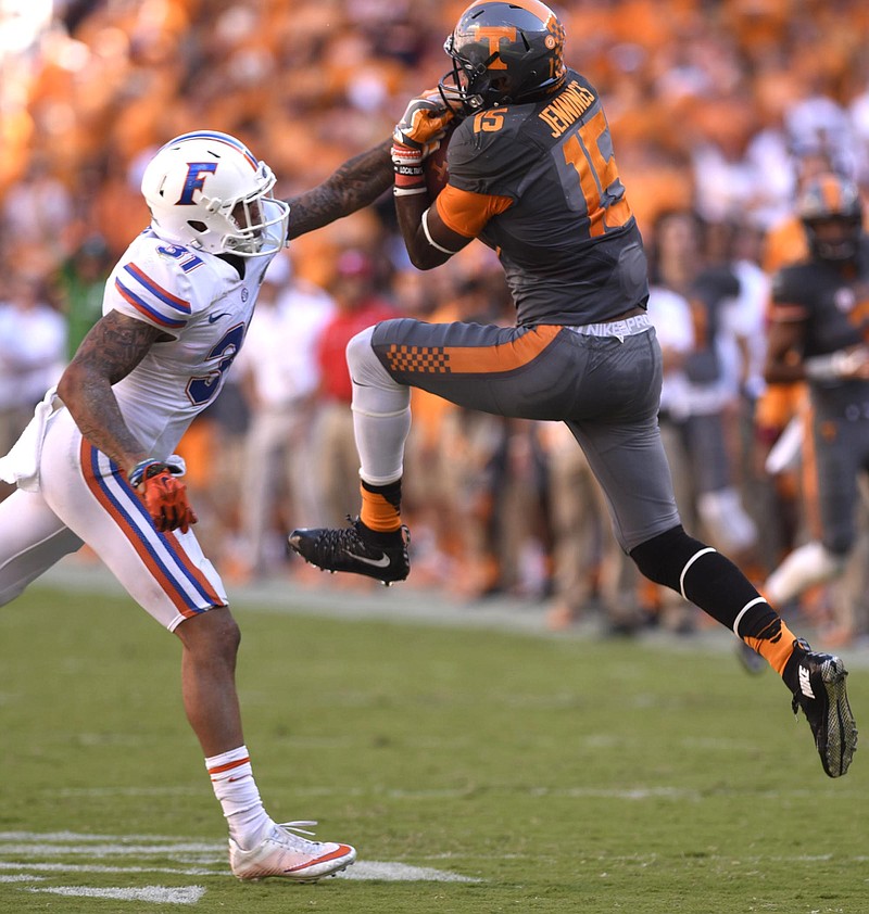 Tennessee's Jauan Jennings (15) pulls in a pass while Florida's Teez Tabor (31) defends.  The Florida Gators visited the Tennessee Volunteers in a important SEC football contest at Neyland Stadium on September 24, 2016.