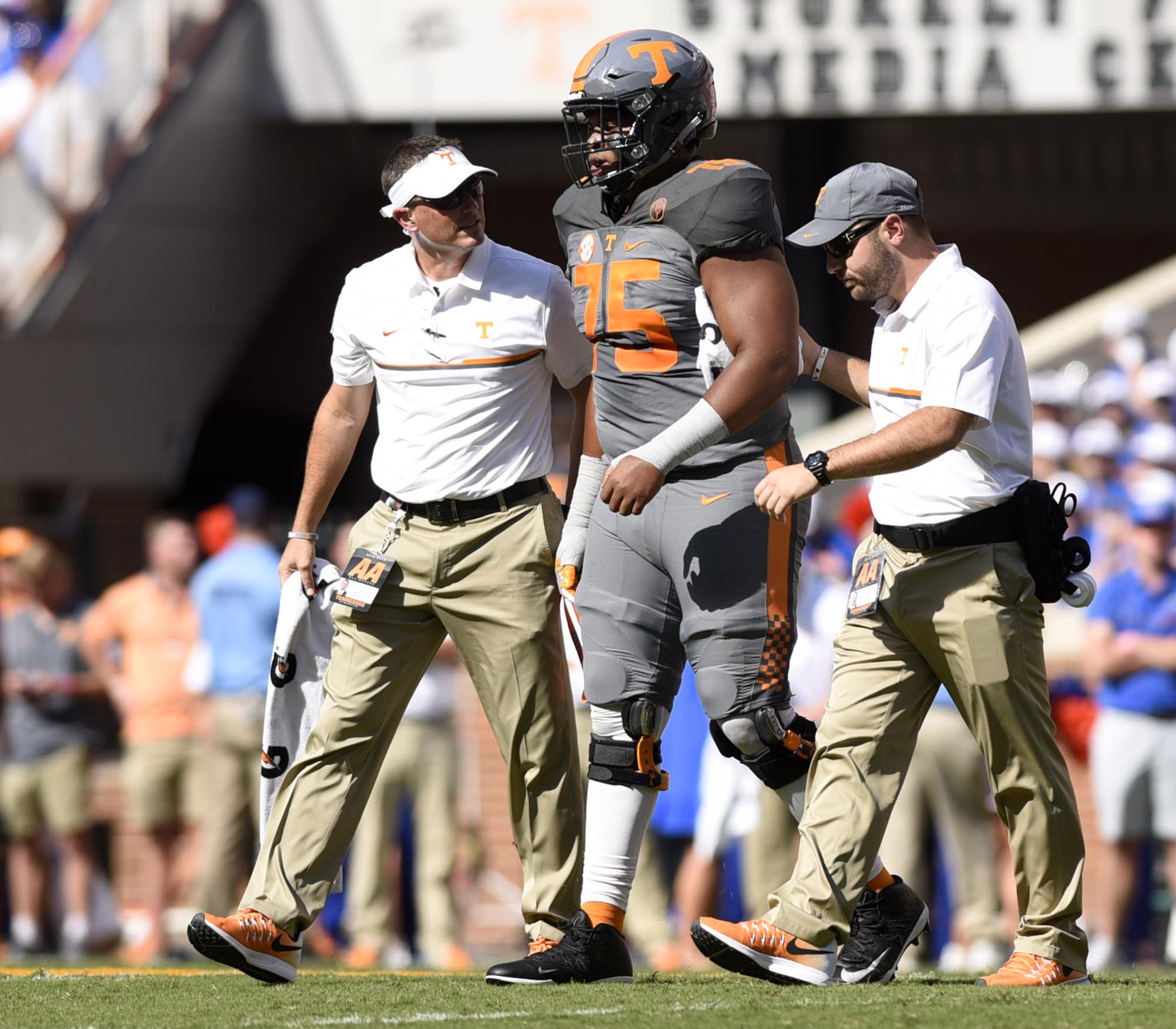 A injured Jashon Robertson (75) is helped off the field. The Florida Gators visited the Tennessee Volunteers in a important SEC football contest at Neyland Stadium on September 24, 2016.