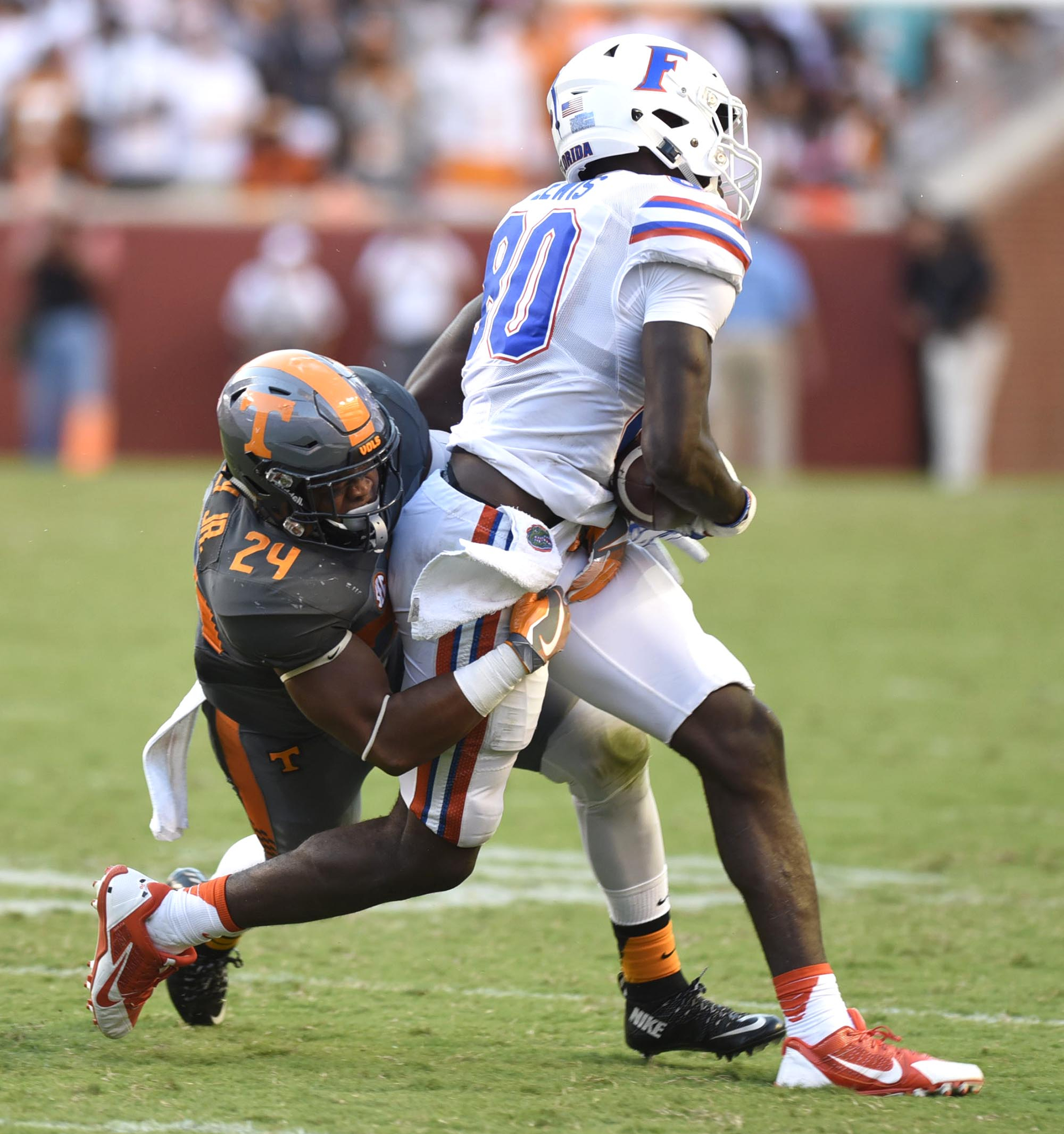 Todd Kelly Jr. (24) makes a stop on Florida's C'yontal Lewis (80). The Florida Gators visited the Tennessee Volunteers in a important SEC football contest at Neyland Stadium on September 24, 2016.