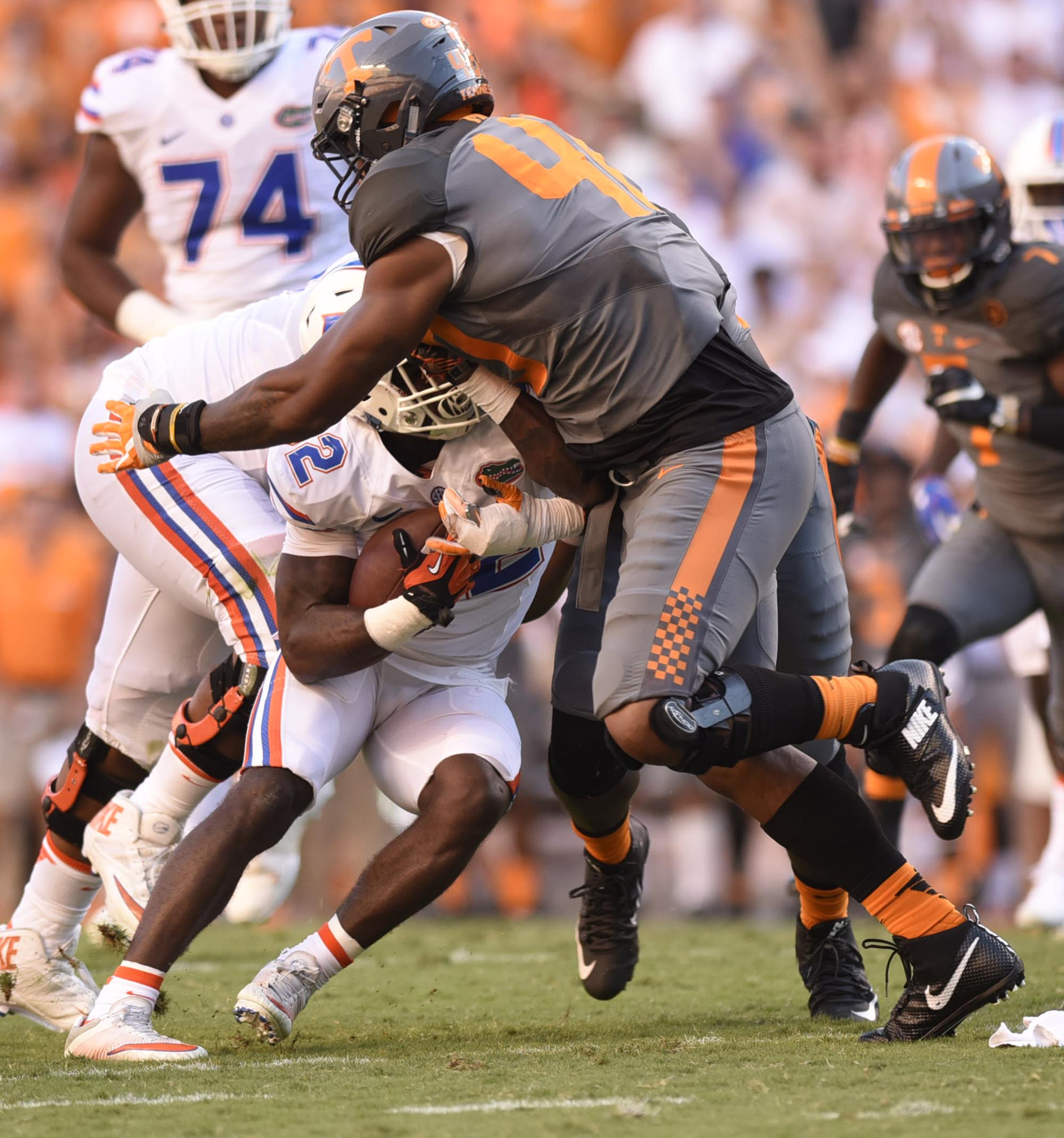 Tennessee's Dimarya Mixson (40) swollens up Florida's Jordan Cronkrite (32) in a big 2nd half stop. The Florida Gators visited the Tennessee Volunteers in a important SEC football contest at Neyland Stadium on September 24, 2016.