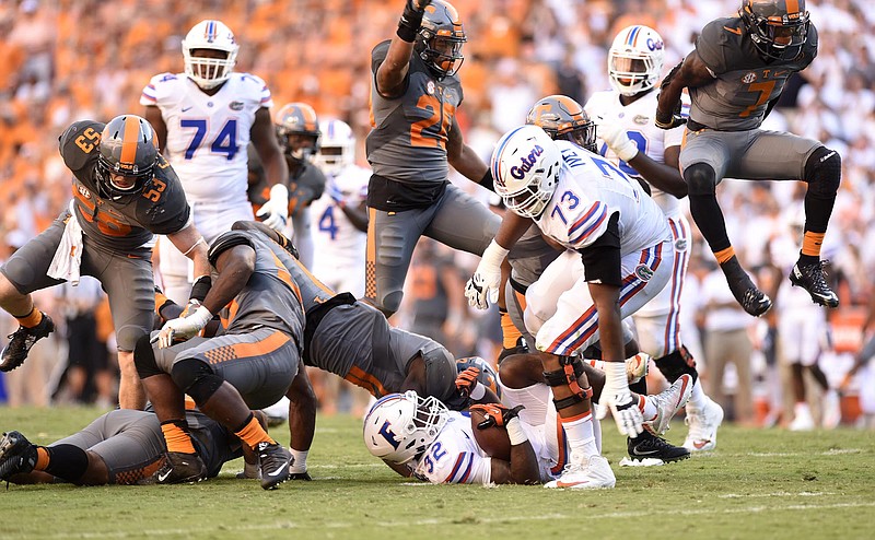 The Tennessee defense celebrates a big 3rd quarter stop.  The Florida Gators visited the Tennessee Volunteers in a important SEC football contest at Neyland Stadium on September 24, 2016.