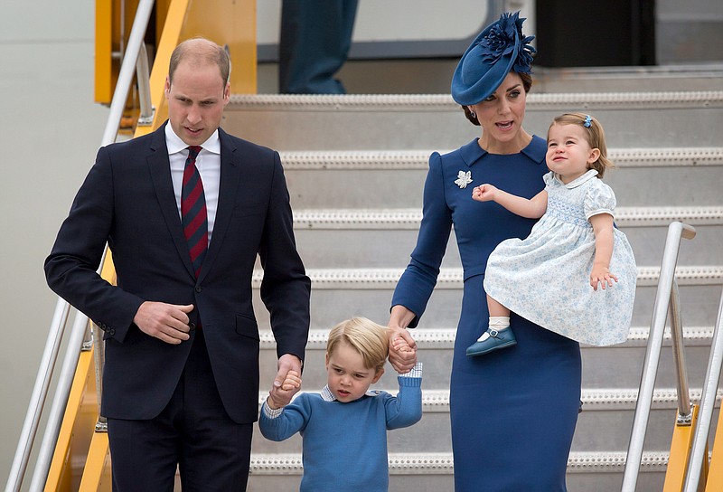 
              Britain's Prince William and his wife Kate, the Duke and Duchess of Cambridge, along with their children Prince George and Princess Charlotte arrive in Victoria, British Columbia, Saturday, Sept. 24, 2016. (Darryl Dyck/The Canadian Press via AP)
            