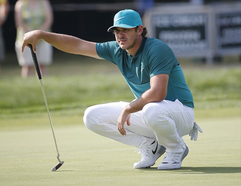 
              FILE - In this July 28, 2016, file photo, Brooks Koepka lines up a putt on the 14th hole during the first round of the PGA Championship golf tournament at Baltusrol Golf Club in Springfield, N.J.  Koepka is the lone American rookie on the Ryder Cup team who already has felt the sting of losing twice.  (AP Photo/Mike Groll, File)
            