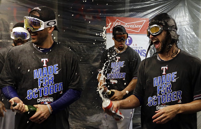 AL West champ Rangers celebrate, plan for another playoffs