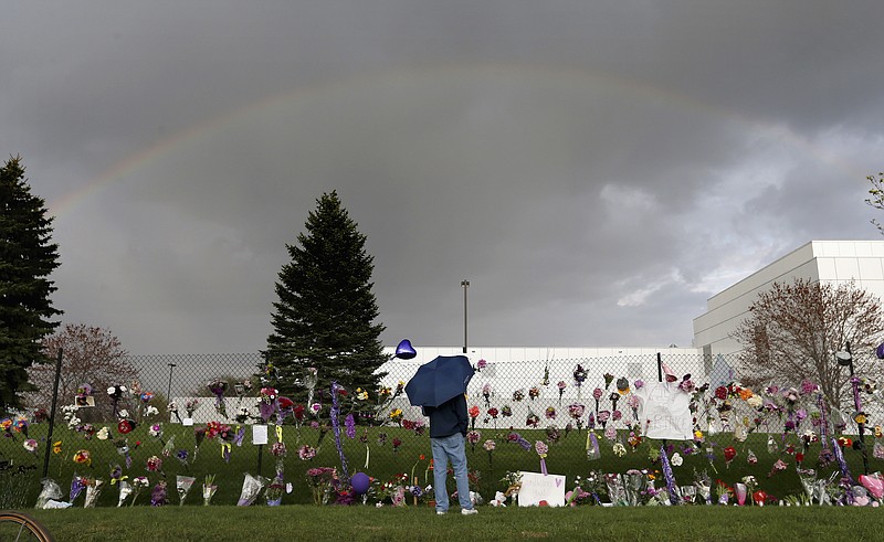 
              FILE - In this April 21, 2016 file photo, a rainbow appears over Prince's Paisley Park estate near a memorial for the rock superstar in Chanhassen, Minn. Work to settle Prince's estate is moving forward, though a closed hearing is expected this week to resolve an undisclosed dispute between the likely heirs and the trust company that's managing the estate. Prince died of an accidental painkiller overdose in April. (Carlos Gonzalez/Star Tribune via AP, File)
            