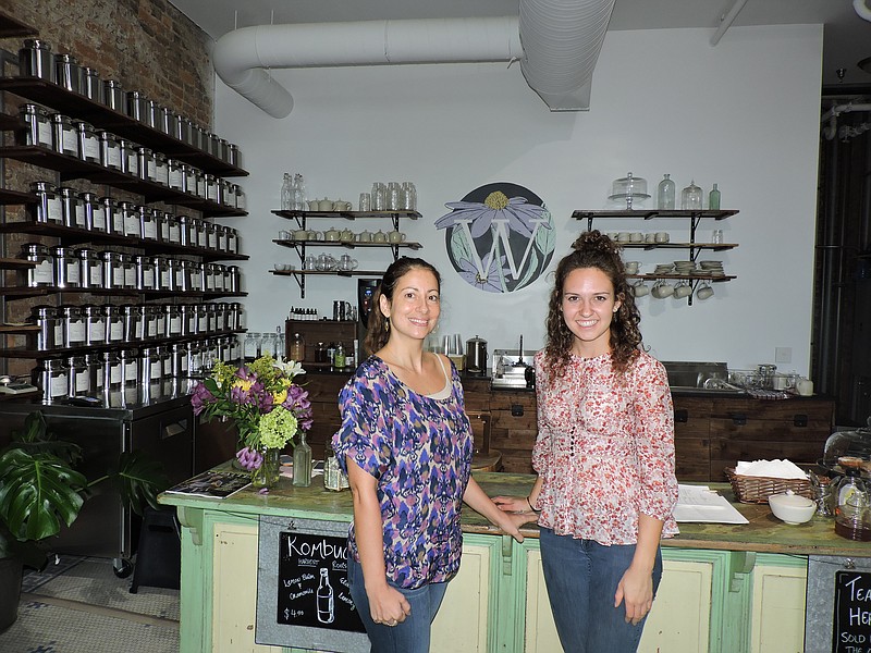 Wildflower Tea Shop & Apothecary owner Hillary Libby, left, and "bateatrist" Kelsey Porter welcome people to the new shop in downtown Chattanooga.