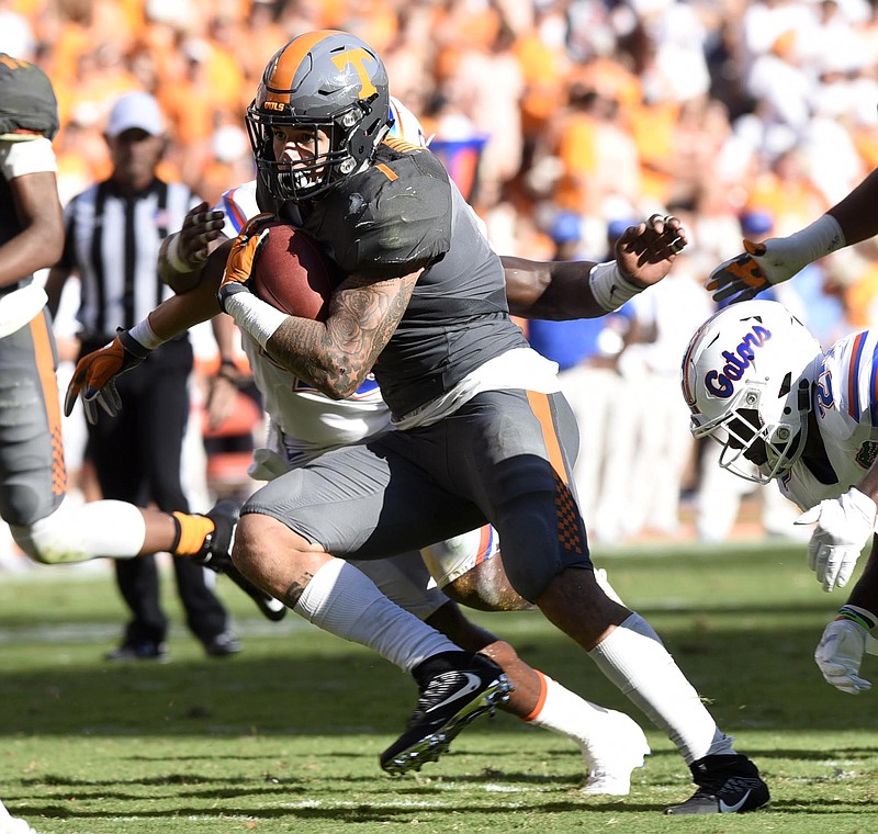 Tennessee's Jalen Hurd (1) goes for yardage in to the Florida secondary.  The Florida Gators visited the Tennessee Volunteers in a important SEC football contest at Neyland Stadium on September 24, 2016.